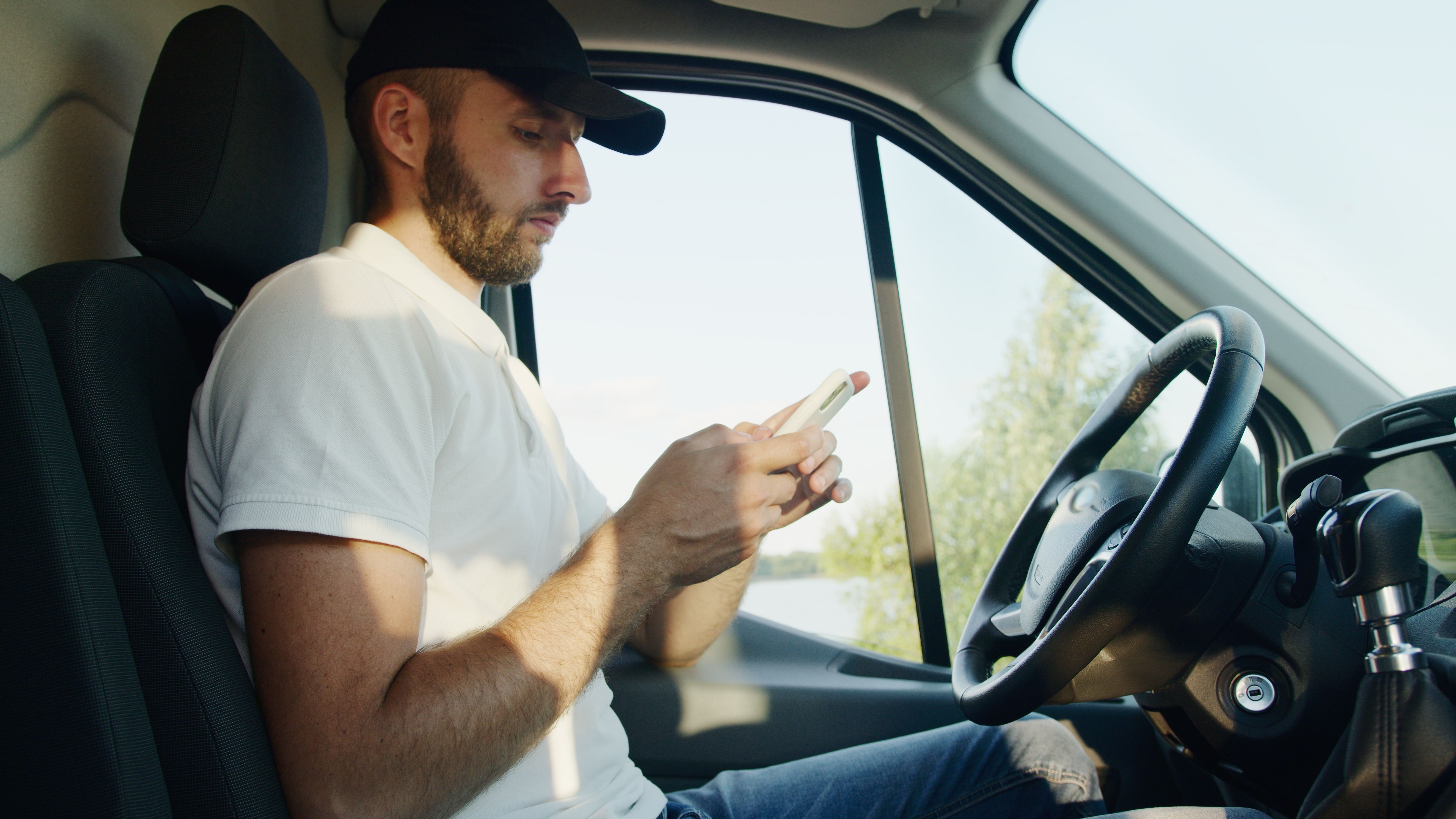 Driver collecting a package at the door